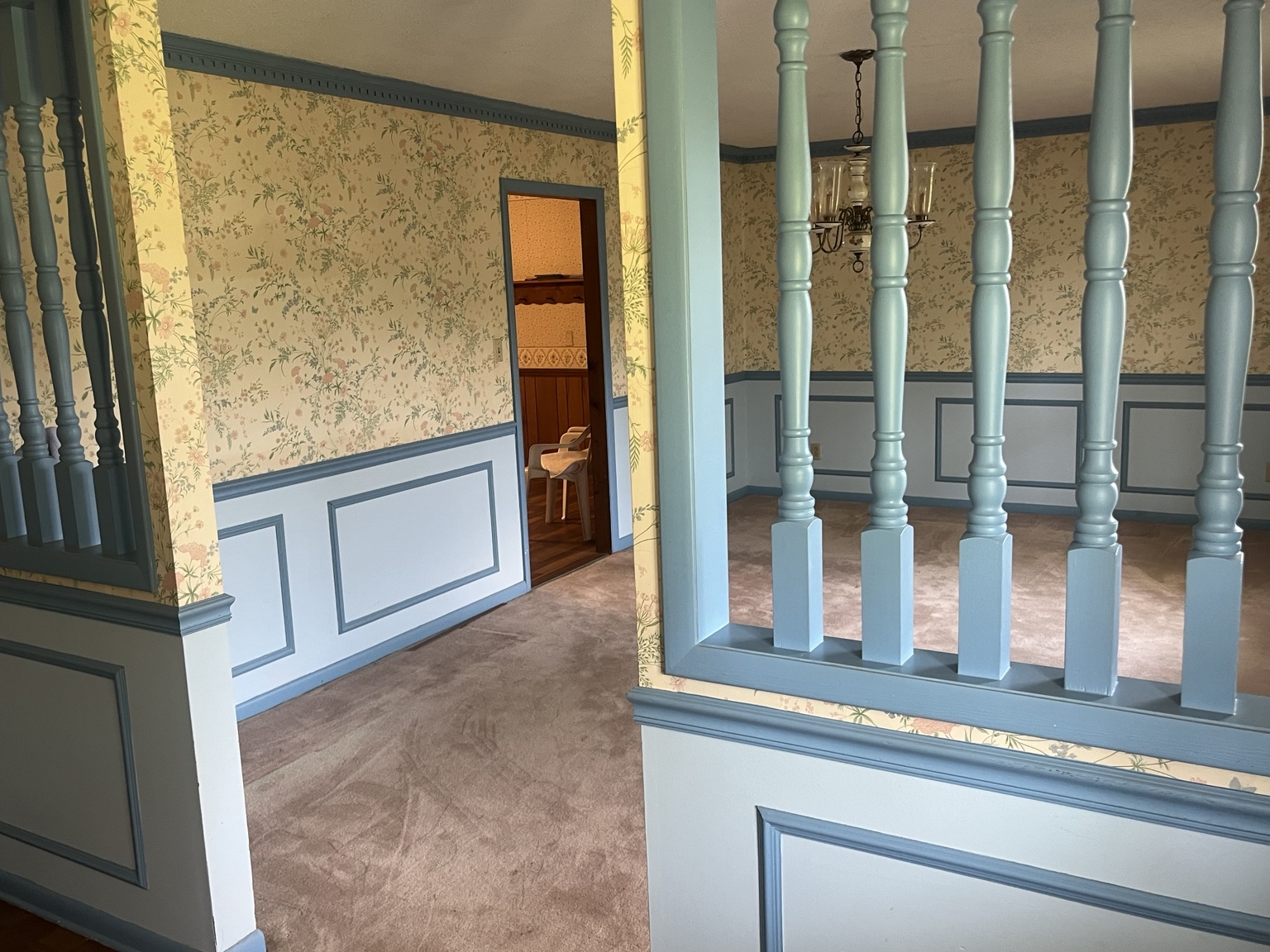 Formal dining room with decorative woodwork